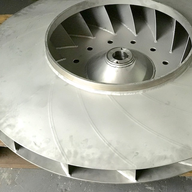 Custom fabricated stainless steel fan hub